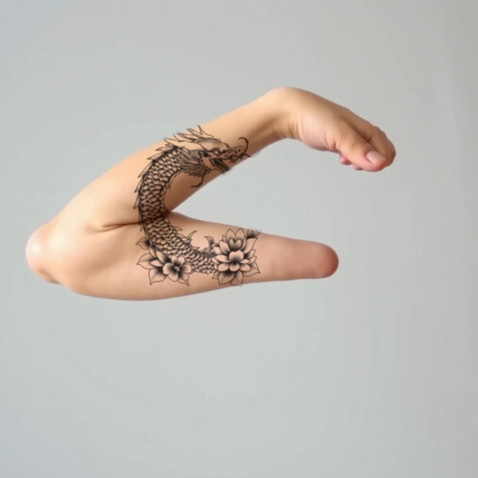 Koi to Dragon Transformation tattoo shown on the half sleeve